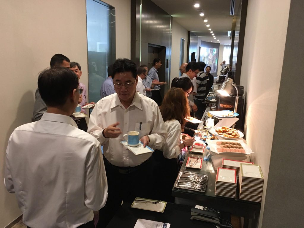 Create Smarter Buildings Seminar Attendees network over tea break